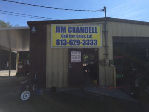 Large outdoor sign for Jim Crandell Golf Cart Sales in Zephyrhills, FL