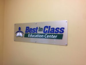 Lobby Sign, cut vinyl over frosted acrylic.