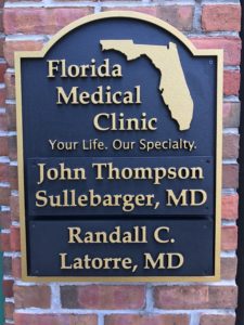 Routed Sign with removable plaques.